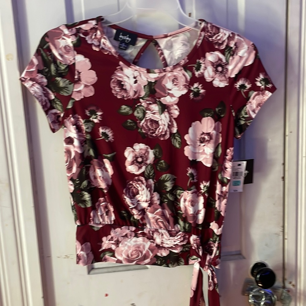 formal blouse, with floral pattern size medium with cut out back